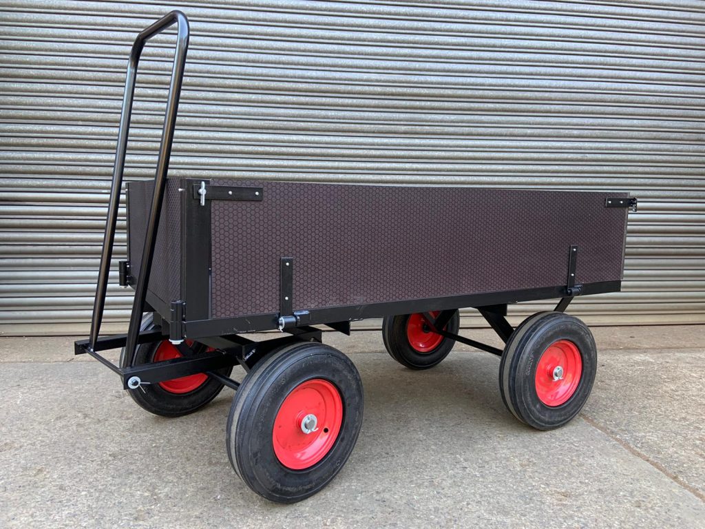 Hinged sided turntable truck